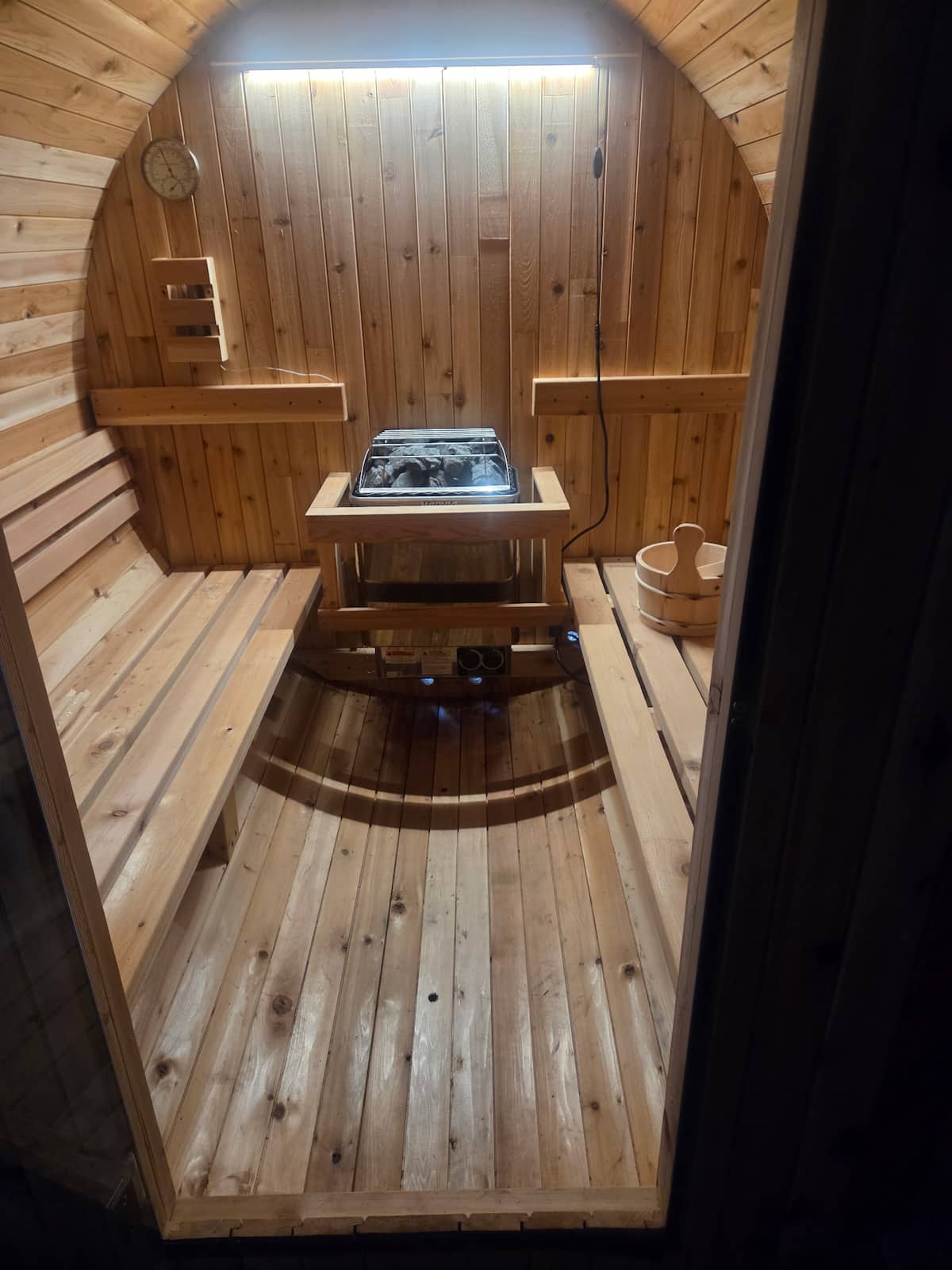 Private wood-lined barrel sauna
