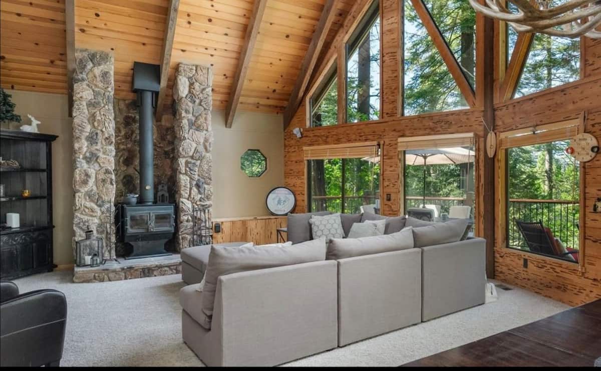 Great room seating around the stone wood stove