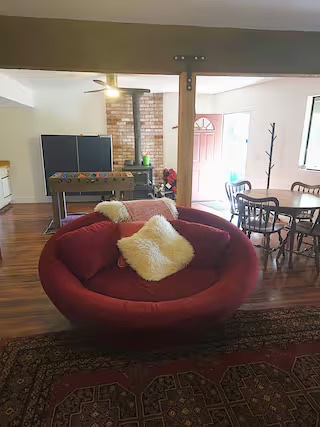 Game room with ping-pong table and lounge seating