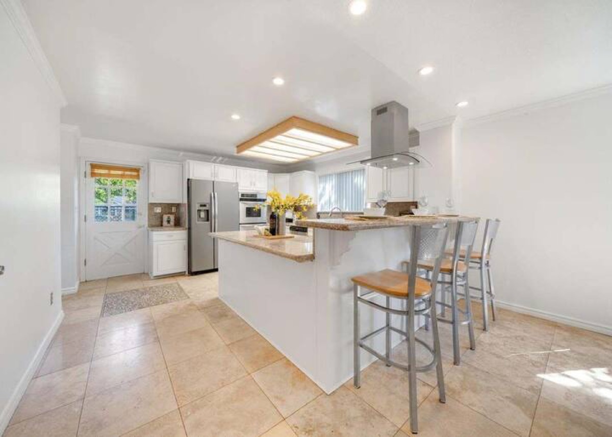 Open kitchen with a large breakfast bar