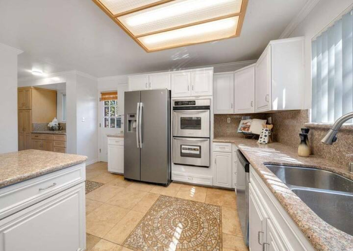 Bright kitchen with generous counters and double ovens